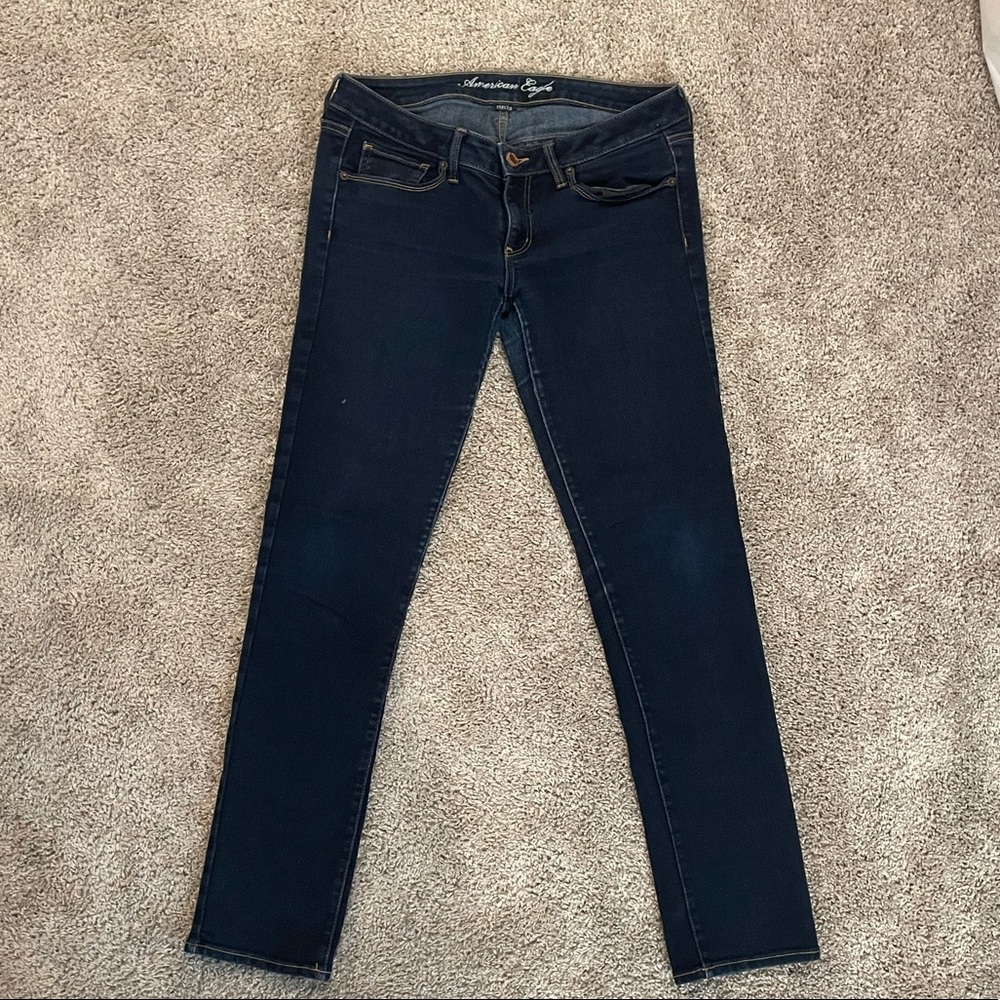 Dark skinny American eagle jeans.